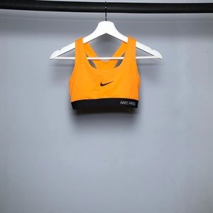 Orange Nike sports bra